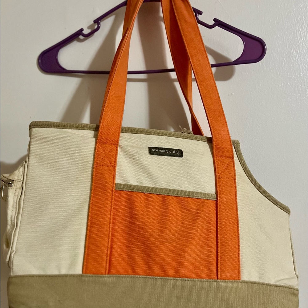 New York dog orange and cream colored dog carrier cold orange small/med